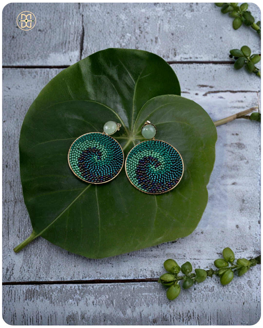 Green spiral earring..